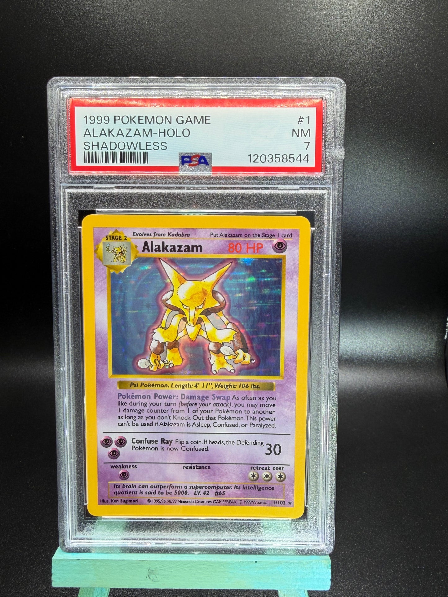 PSA 7 Alakazam Holo Shadowless #1 Base Set