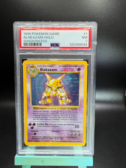 PSA 7 Alakazam Holo Shadowless #1 Base Set