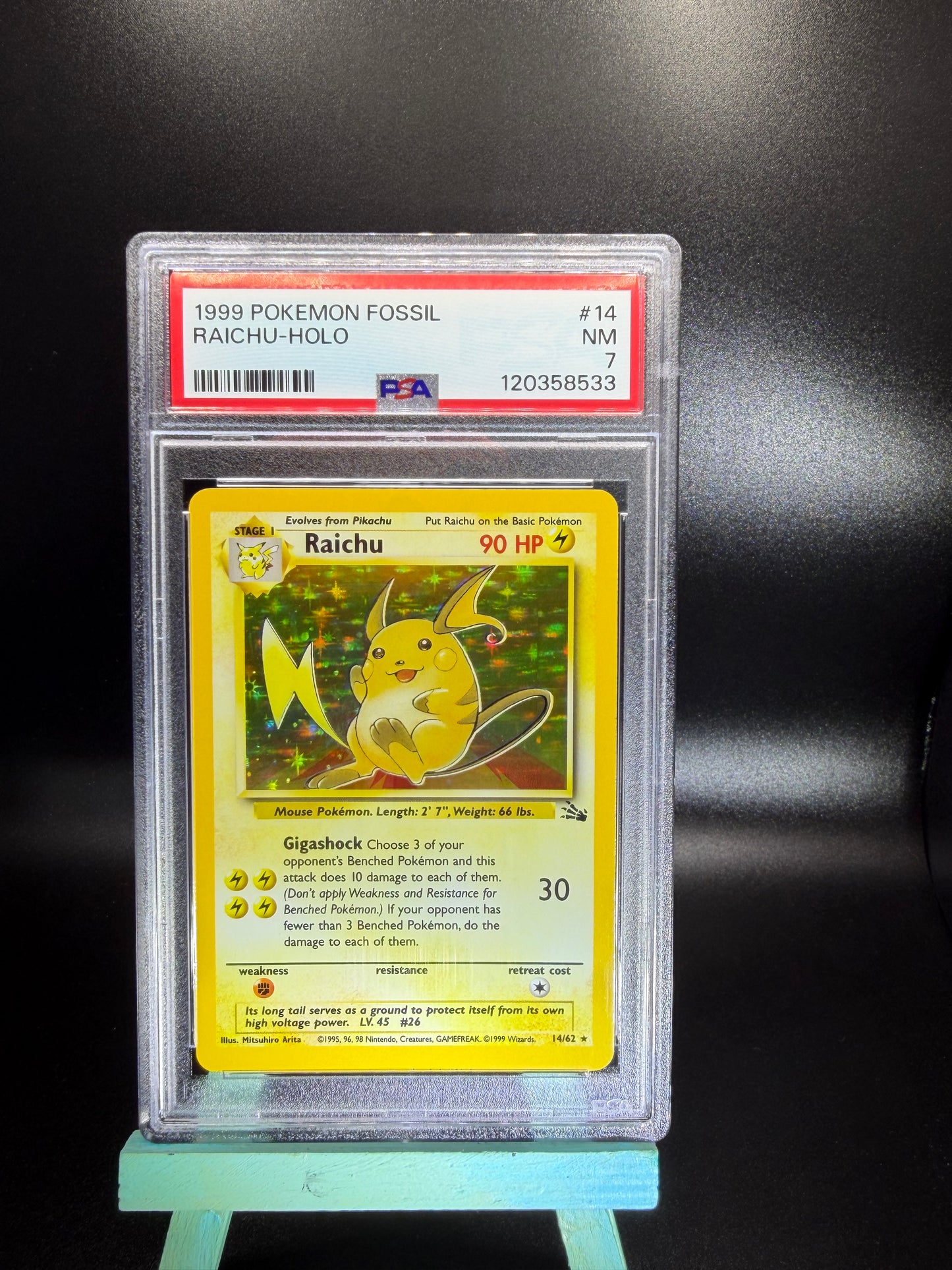 PSA 7 Raichu Holo #14 Fossil
